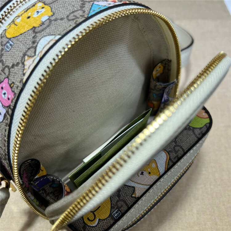 Replica-Gucci-Animal-Print-Multi-function-Bag-725654-FABOF-9741-7.jpg