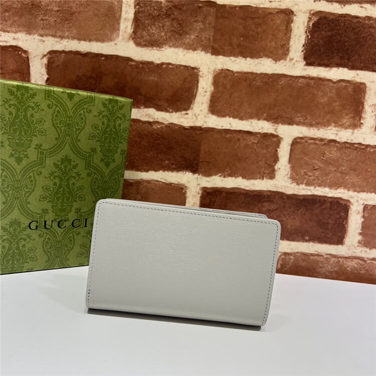 Replica-Gucci-Zip-Around-Wallet-With-Gucci-Script-772640-0OP0N-1440-3.jpg