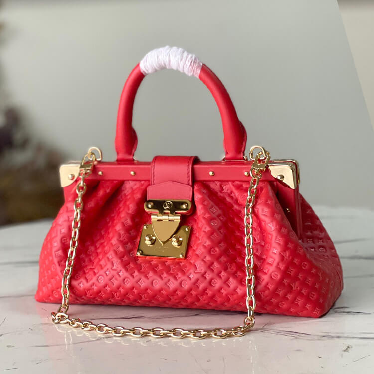Replica-LV-Monogram-Clutch-M22327-2.jpg
